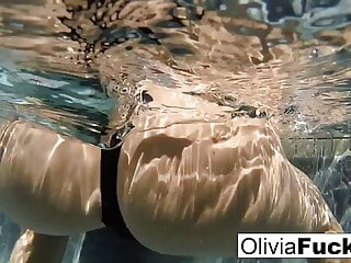 Horny Olivia Austin plays with her pussy underwater