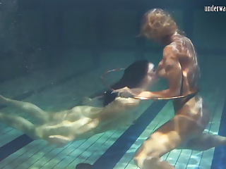 Babes, swim, strip and have fun underwater