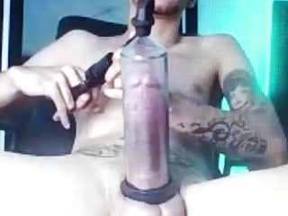Latino vac tube pumping his huge thick cock in the tube 
