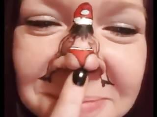 Dancing Santa on girl&#039;s nose