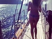 Heidi Klum on a boat from behind