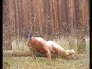 Humping naked a fallen tree trunk