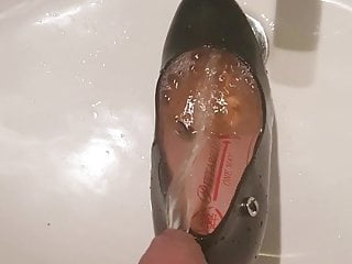 Whores shoe filled with hot piss...