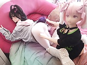 Two mini sex dolls lick each other's pussies