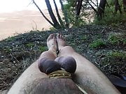 slave4udom naked, feet, tied blows on balls cock, outdoor.