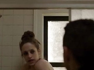 Carly Chaikin takes a shower