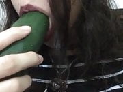 Suck the cucumber like a big cock