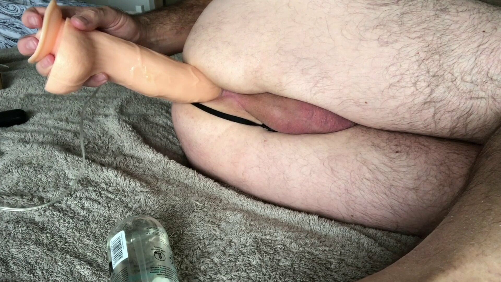 Guy in thong takes ten inch anal dildo till he cums - 5