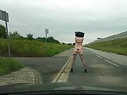 Strip on public street - only bra, stockings and heels left