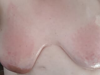 Disobedient fat bitch has to spank her oiled saggy tits as punishment