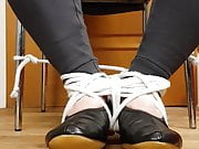 Self bondage feet while wearing black leather gymnastic shoe