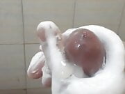 Nice foam massage with cumshot in bath