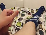 Stroking in football socks