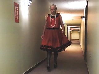 In Red In Hotel Hallway...