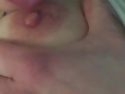 I play with my pussy and sucking my boobs in bed 