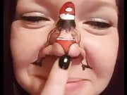 Dancing Santa on girl's nose