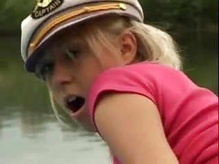 Girl in boots toy fucking on a boat