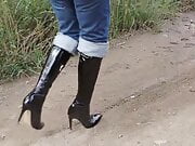 Girl walk in high boots in mud!