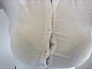 big boobs under a tight white blouse