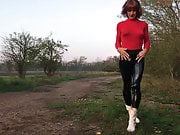 in tight Leatherpants posing outdoor
