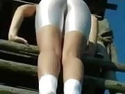 climbing  in  white spandex