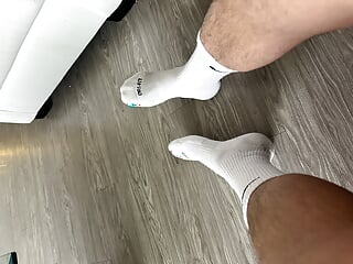 Sock Jock Removing Shoes After Long 8 Work Day