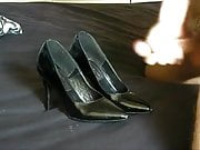 Cummed black patent heels