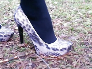 Lady L walking with leopard high heels.