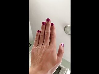 Crossdresser with Pink Painted Nails