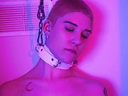 Sexy girl chained up in collar, wrist and ankle restraints