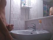 Big cumshot makes the faucet to drip with cum