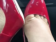 Red Stiletto Heels in Car