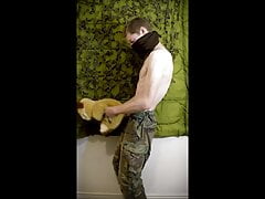 soldier screwing plush toy on military base and ejaculates on his own stomach