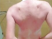 Hot ginger taking a shower
