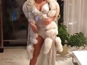 Sexy woman in fur coat