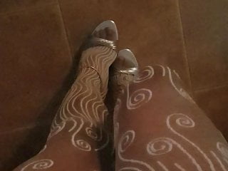 , fancy stockings and white heels...