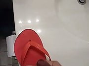 Friend having fun with his step moms Maria flip flops at home