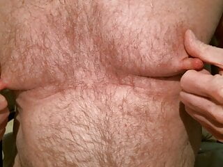 Playing with my pumped nipples...