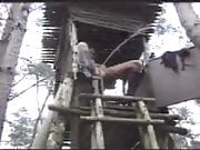 woman Pissing From A Tree House