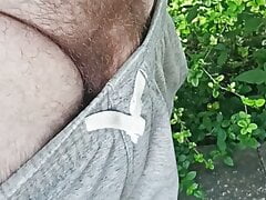 Playing outdoors with flaccid cock