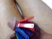 Cock in cloth pegs 